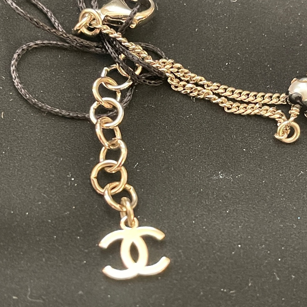CHANEL Gold Bracelet with Pearl and Black Accents - Picture 8 of 10
